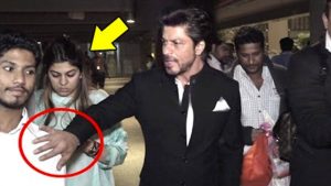 OMG! Furious Shah Rukh Khan Pushes Away A FAN To Save A Lady At Airport - Watch Video