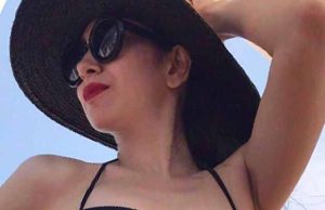 PHOTOS: Karisma Kapoor Poses In A Bikini While Holidaying In Europe