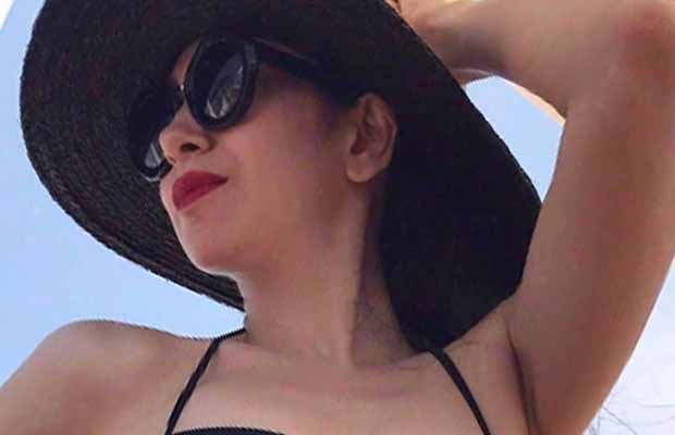 PHOTOS: Karisma Kapoor Poses In A Bikini While Holidaying In Europe